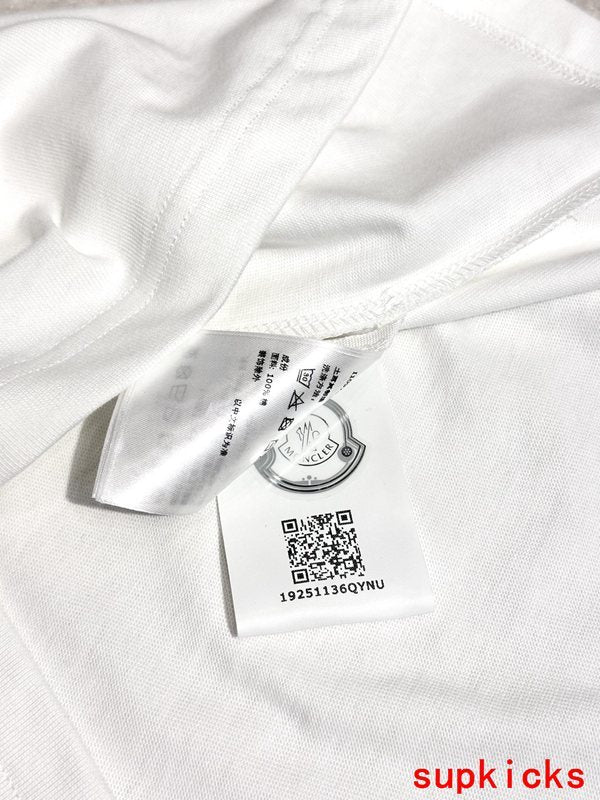 Side profile of Moncler luxury clothing with signature branding