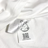 Side profile of Moncler luxury clothing with signature branding