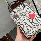 Ziva's Charm handbag – detail view (one versatile size)