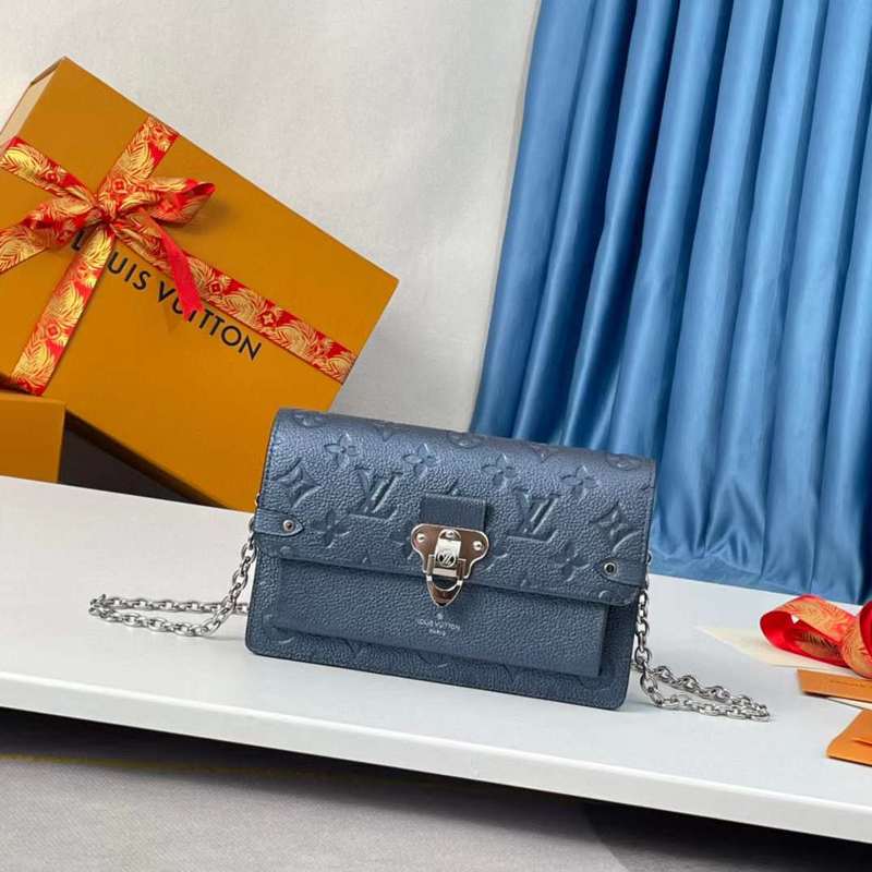 Front view of sleek polished women's handbag – women's statement bag