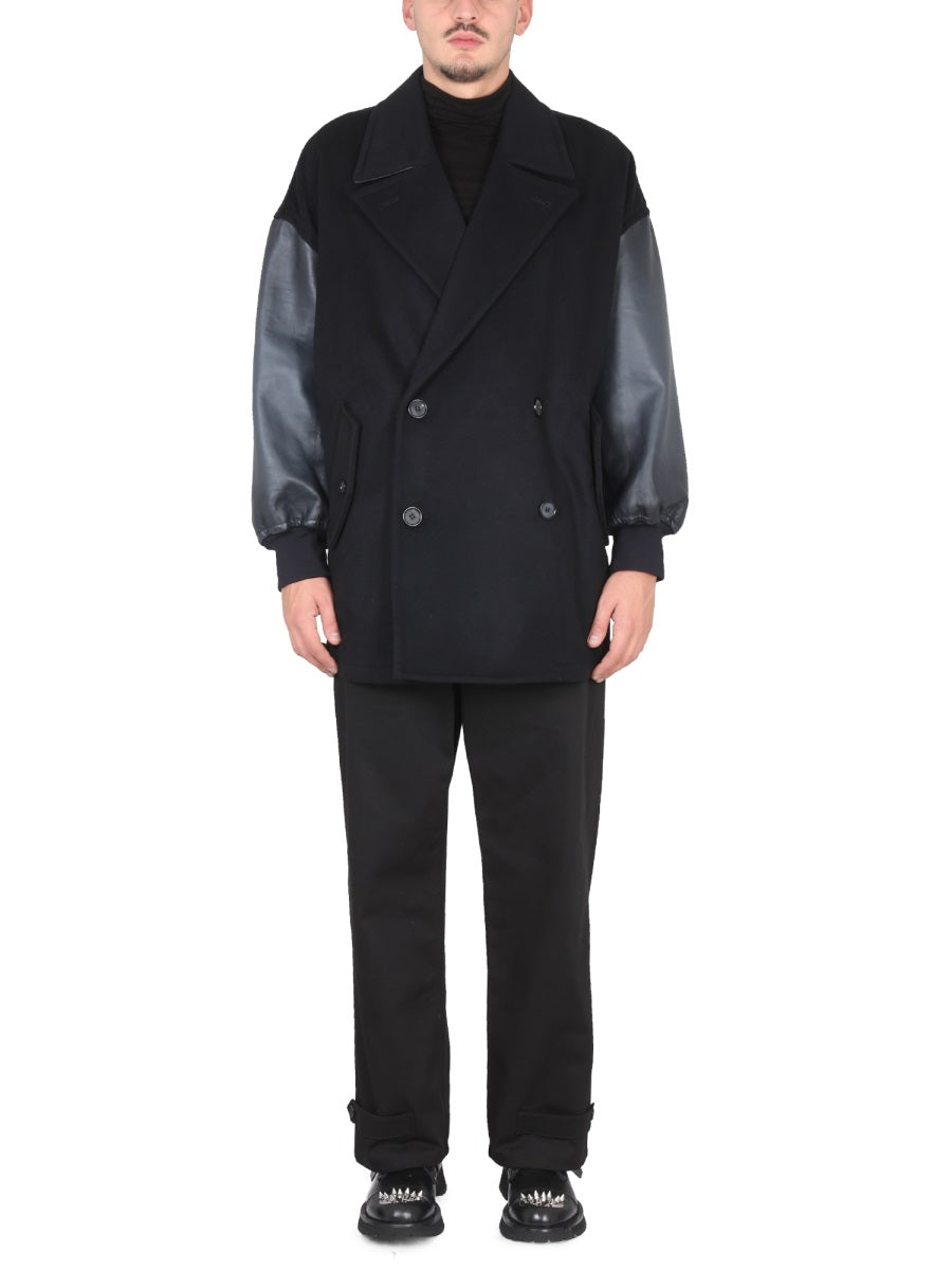 Alexander McQueen premium coats detail and craftsmanship close-up