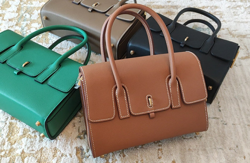 Side view of sculpted structured handbag