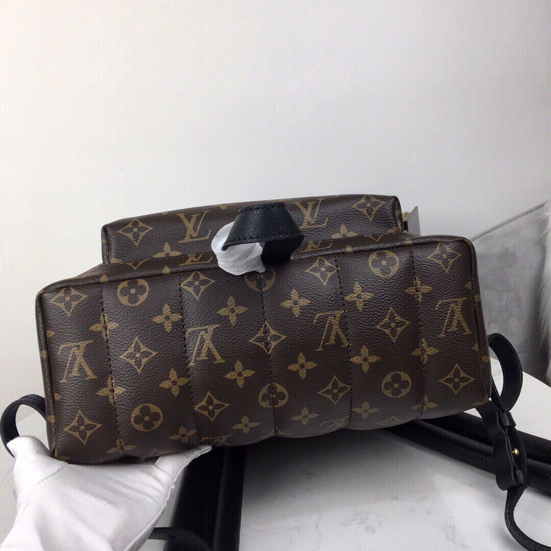 Styled lifestyle shot of signature classic women's handbag – women's statement bag