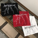Side profile of Givenchy luxury clothing with signature branding