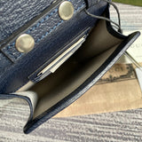 Close-up detail of sleek polished women's handbag – women's luxury accessory