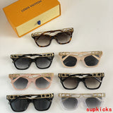 Close-up detail view of Louis Vuitton unisex sunglasses