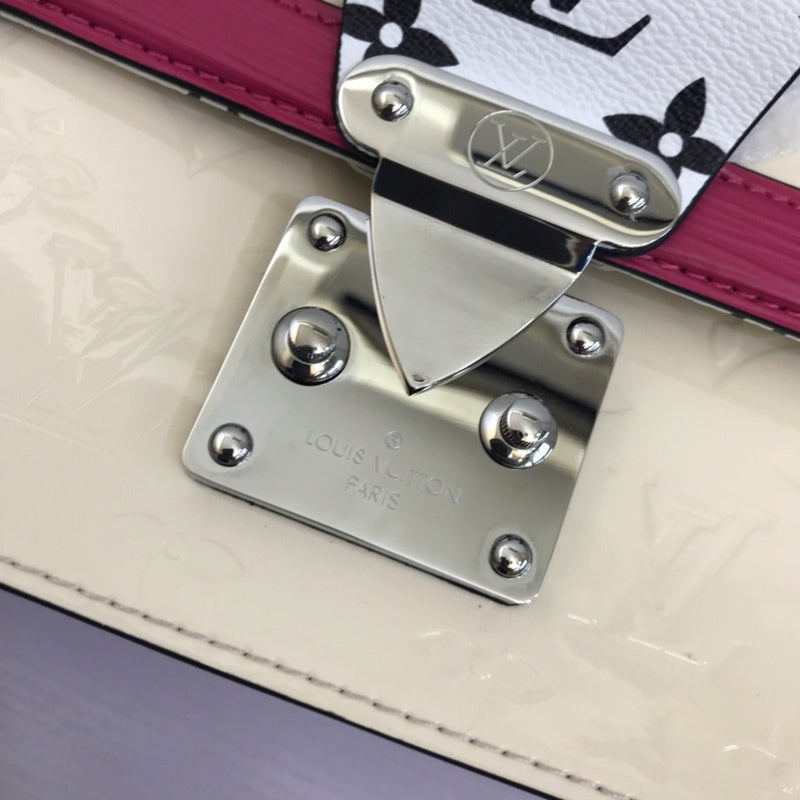 Back view of refined signature women's handbag – women's luxury handbag