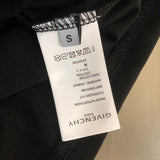 Side profile of Givenchy luxury clothing with tailored silhouette