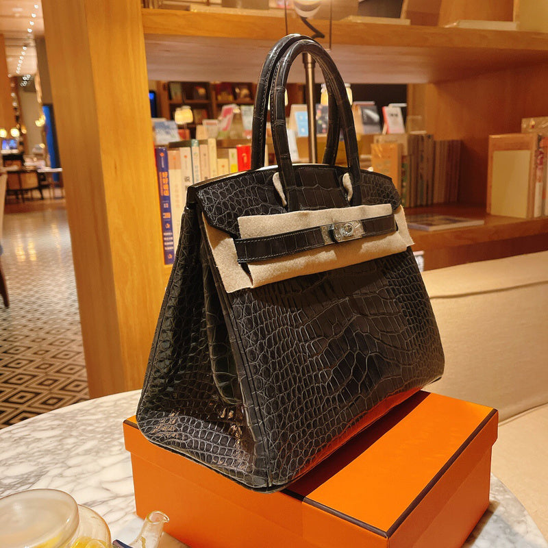 Side view of effortless structured handbag