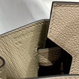 Side view of sleek structured handbag