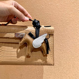  polished handbag styled with outfit