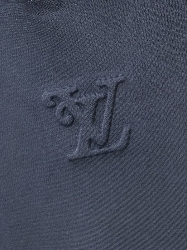 Close-up detail shot of Louis Vuitton luxury clothing with contemporary cut