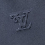 Close-up detail shot of Louis Vuitton luxury clothing with contemporary cut
