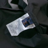 Back view of Louis Vuitton luxury clothing with monogram-inspired silhouette