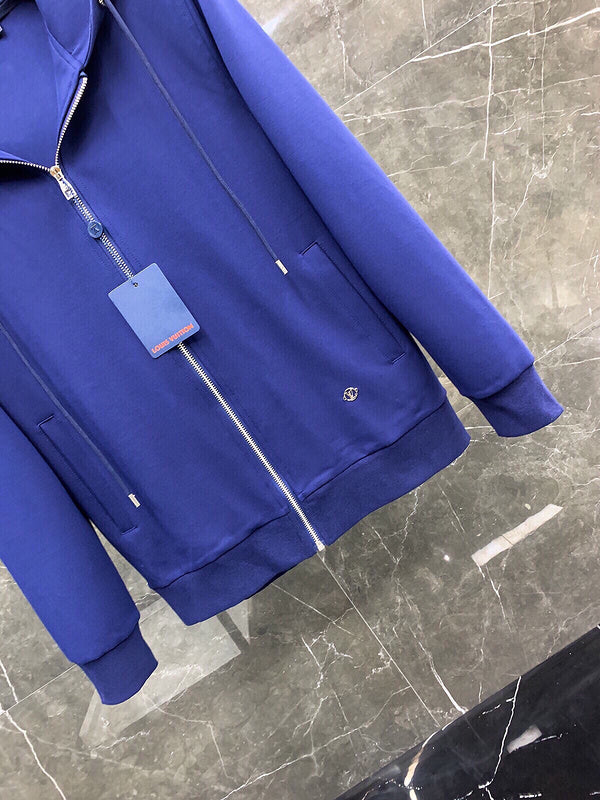 Back view of Louis Vuitton luxury clothing with monogram-inspired silhouette