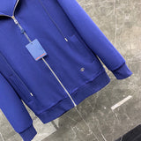 Back view of Louis Vuitton luxury clothing with monogram-inspired silhouette