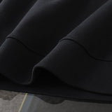 Back view of Louis Vuitton luxury clothing with tailored silhouette