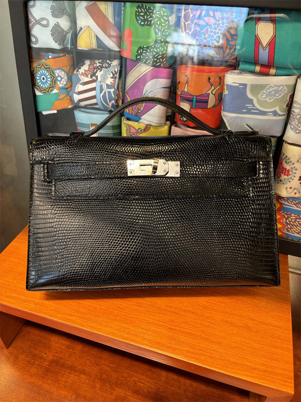 Side view of modernist structured handbag