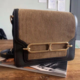 Streamlined handbag styled for everyday wear