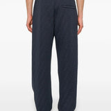 Close-up of Fendi pants hardware and fine stitching