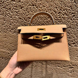 Side view of tailored structured handbag