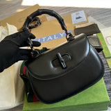 Back view of classic statement women's handbag – women's statement bag