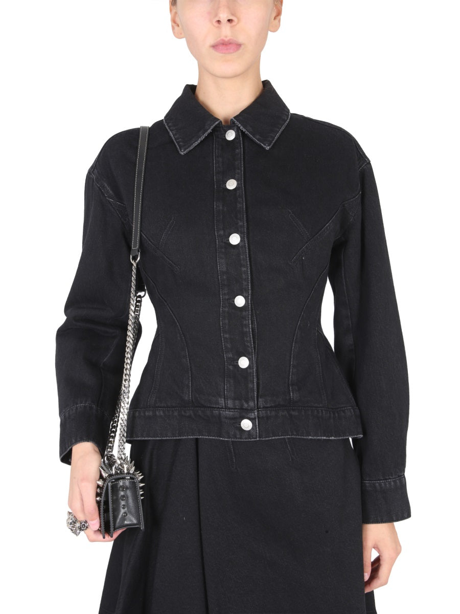 Close-up of Alexander McQueen jackets hardware and fine stitching