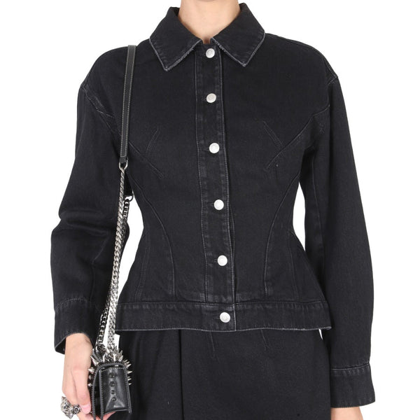 Close-up of Alexander McQueen jackets hardware and fine stitching
