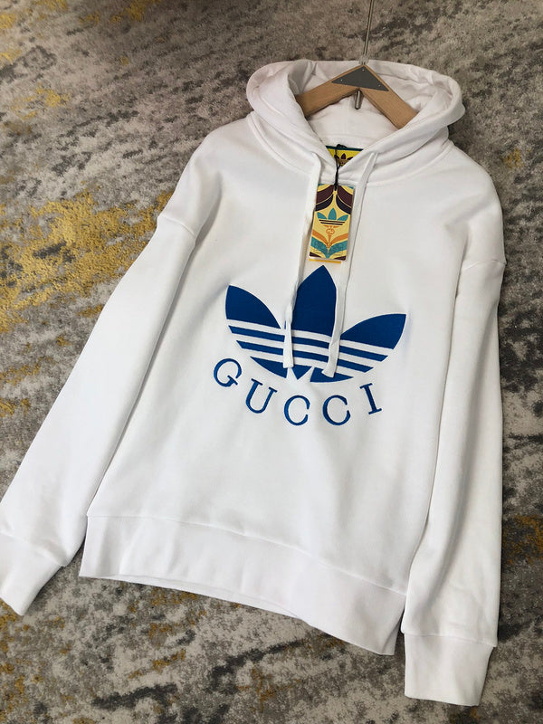 Close-up detail shot of Gucci luxury clothing with label-forward styling