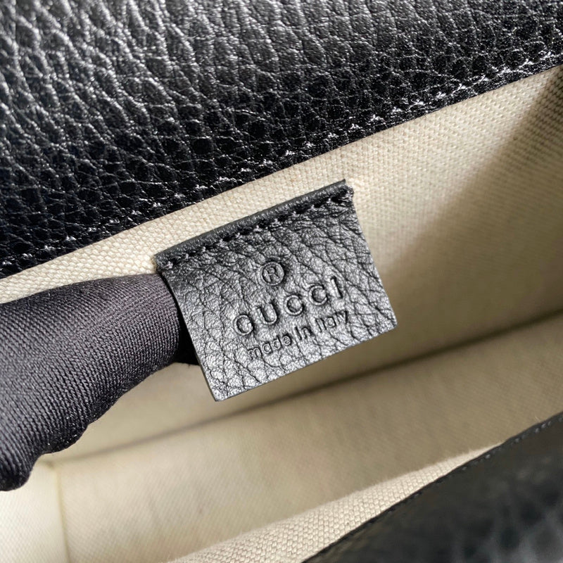 Side profile of everyday-luxe signature women's handbag – women's designer-style accessory