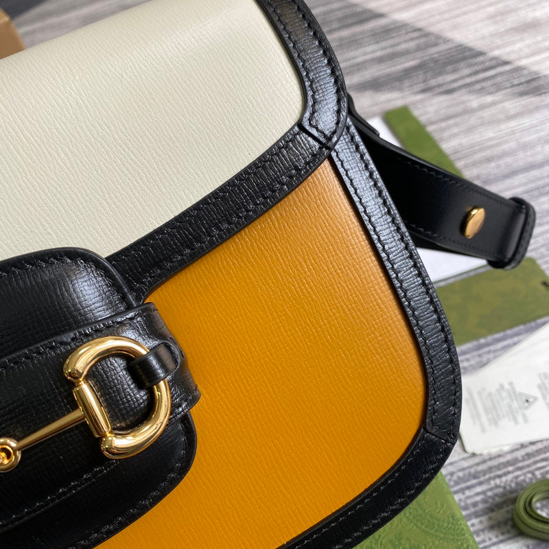 Styled lifestyle shot of modern chic women's handbag – women's luxury handbag
