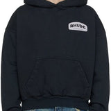 Front view of Rhude luxury clothing with signature branding