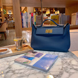 Side view of contemporary structured handbag