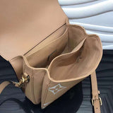 Front view of structured polished women's handbag – women's luxury accessory