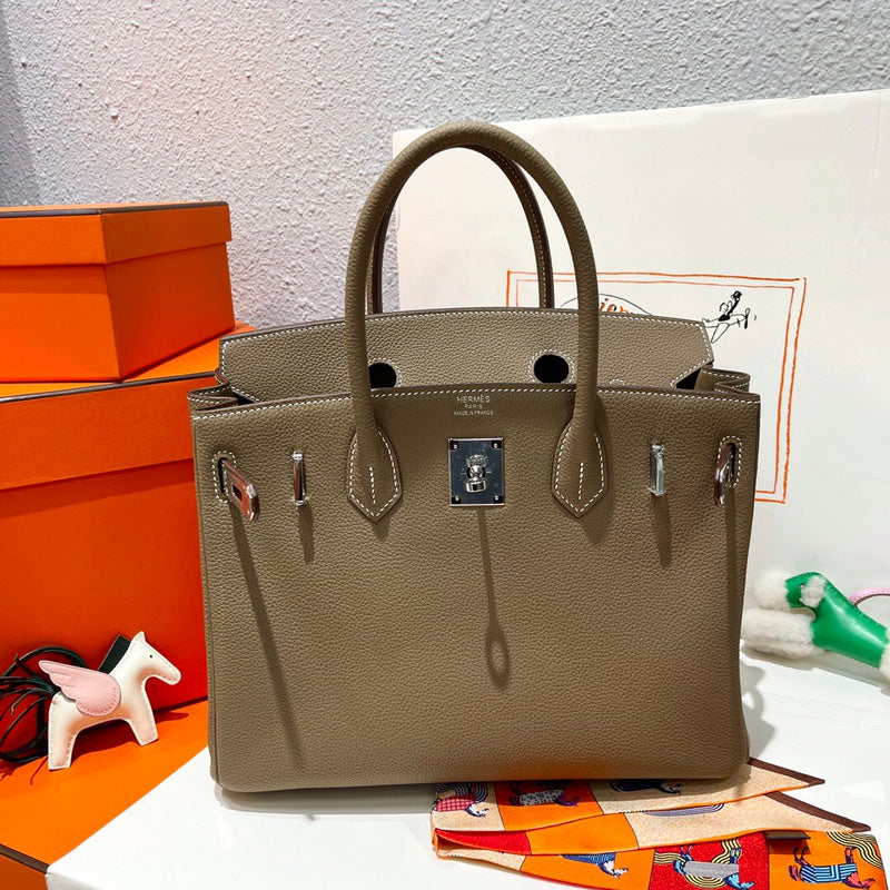 Side view of modernist structured handbag