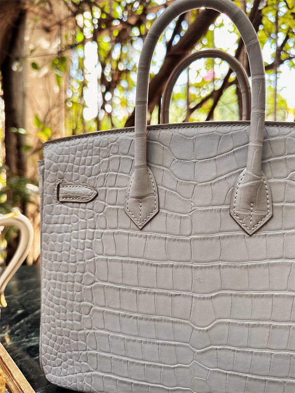 Side view of structured structured handbag