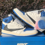 Side profile of Nike neutral cream sneakers signature lace-up style