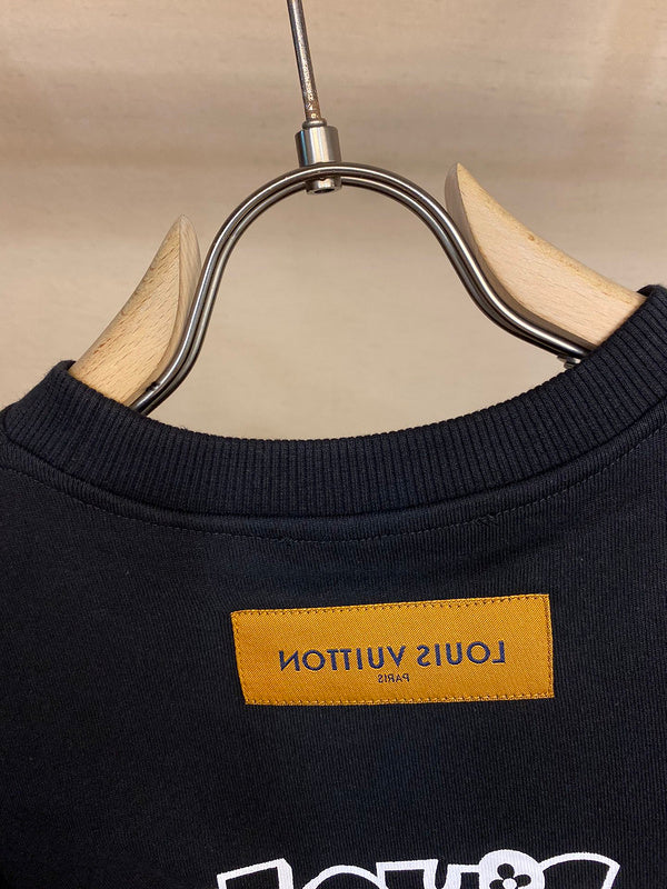 Side profile of Louis Vuitton cotton t-shirt with signature branding