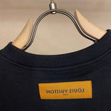 Side profile of Louis Vuitton cotton t-shirt with signature branding