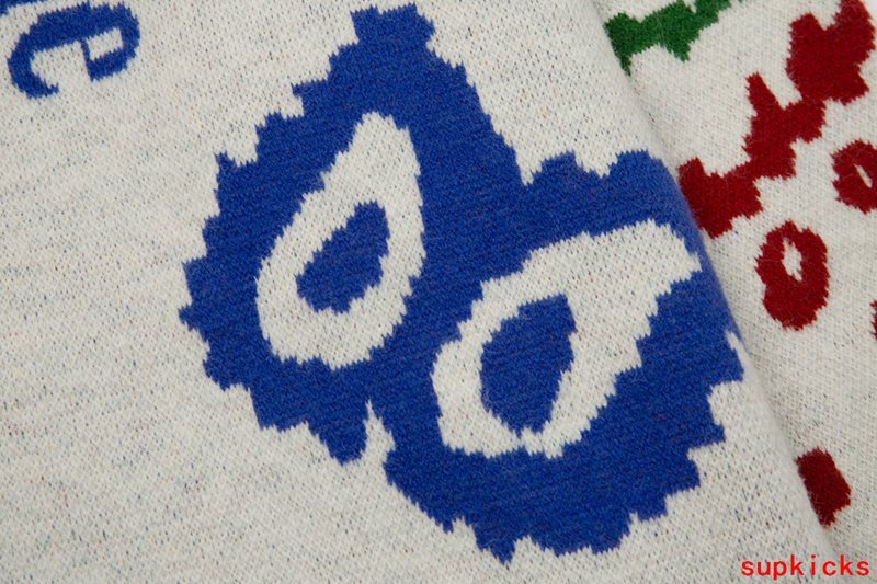 Close-up detail shot of Rhude luxury clothing with monogram-inspired silhouette