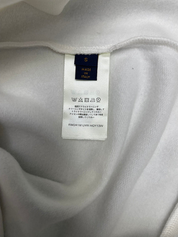 Back view of Louis Vuitton luxury clothing with everyday silhouette