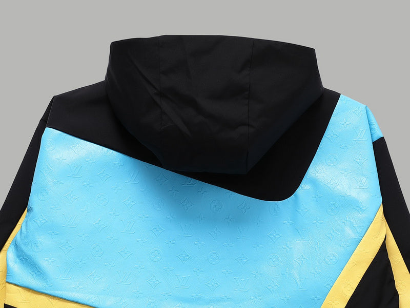 Close-up detail shot of Louis Vuitton luxury clothing with signature branding