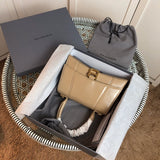 Side profile of modern statement women's handbag – women's luxury handbag