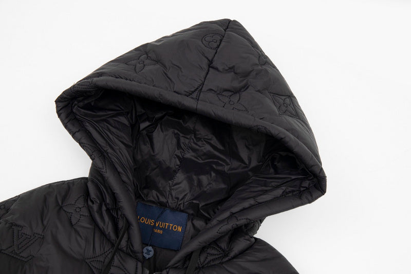 Close-up detail shot of Louis Vuitton luxury clothing with monogram-inspired silhouette