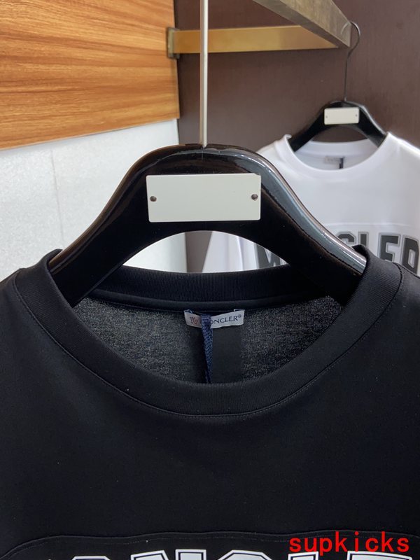 Close-up detail shot of Moncler luxury clothing with relaxed-fit cut
