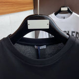 Close-up detail shot of Moncler luxury clothing with relaxed-fit cut