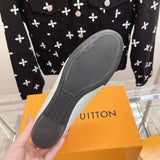 Louis Vuitton Tan High-Top Sneakers - Close-Up Texture View