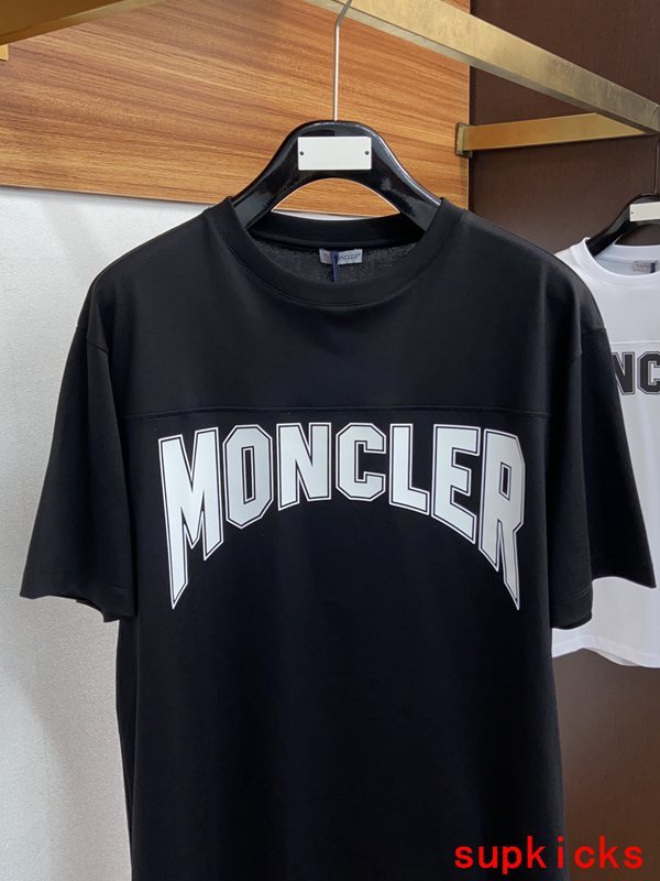 Side profile of Moncler luxury clothing with relaxed-fit cut
