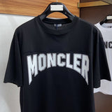 Side profile of Moncler luxury clothing with relaxed-fit cut