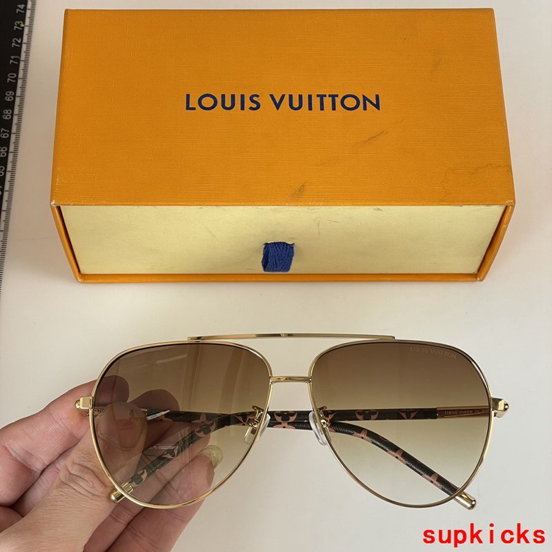 Close-up detail view of Louis Vuitton unisex sunglasses